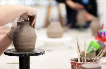 Students,Working,With,Clay,Getting,Their,Hands,Dirty.,Visual,Art