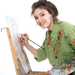 Attractive,Girl,Painting,With,Oil,Paints,,Professional,Painter,At,Work
