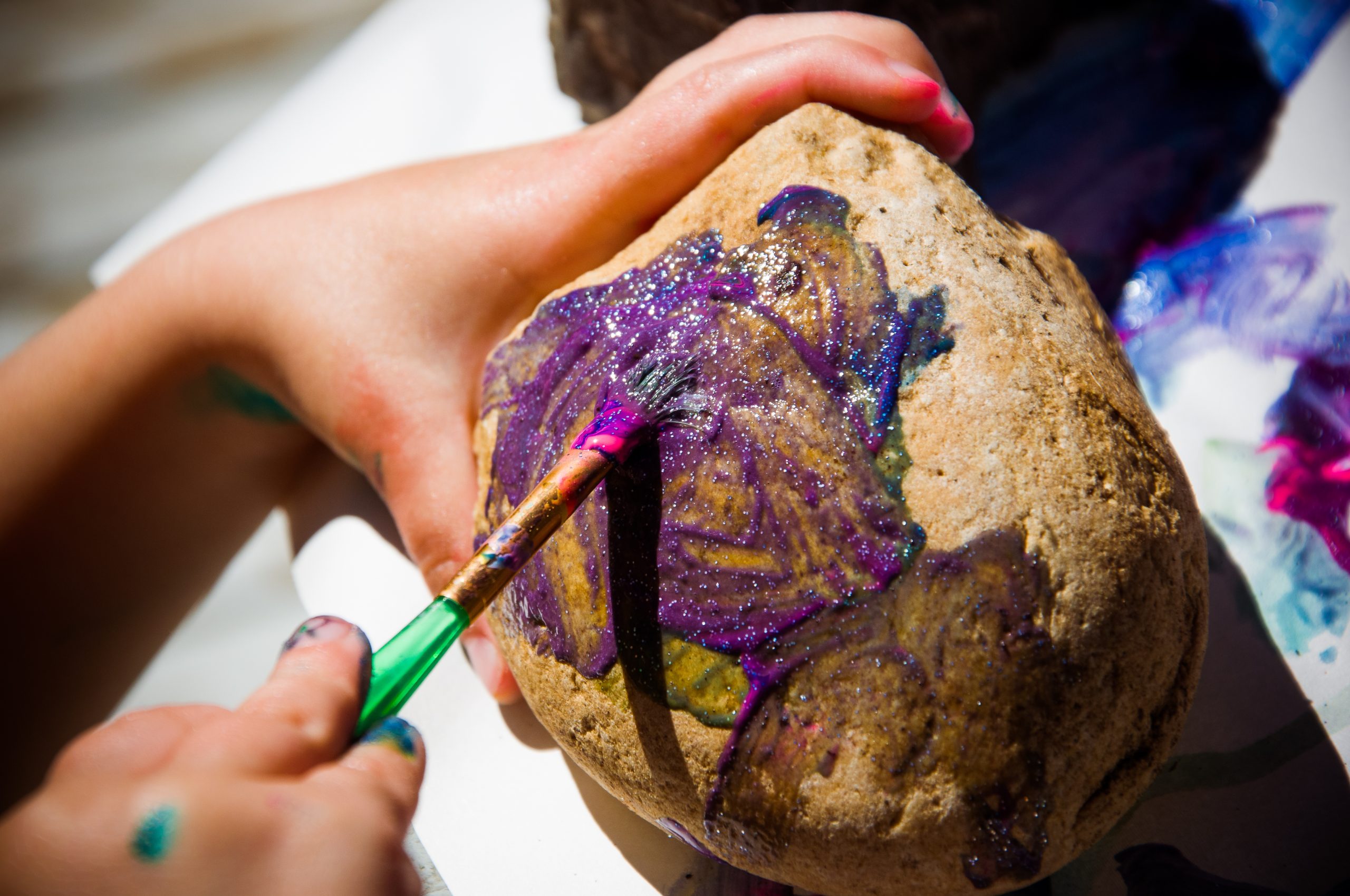 Girl,Painting,Stone,With,Purple,Paint